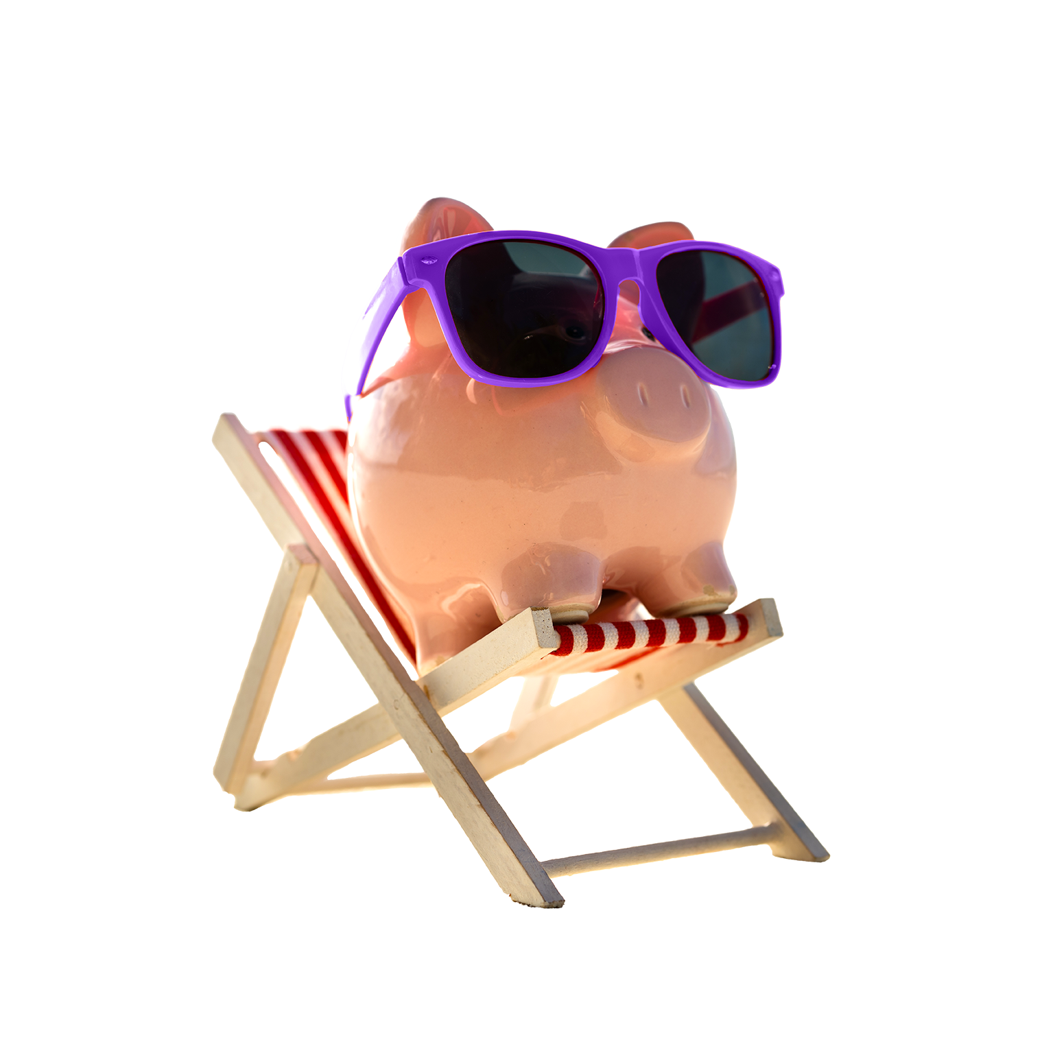 Piggy bank relaxing on a deck chair