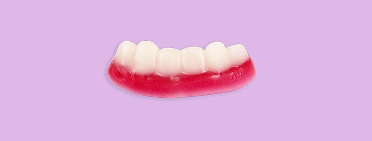 Lolly teeth on purple background